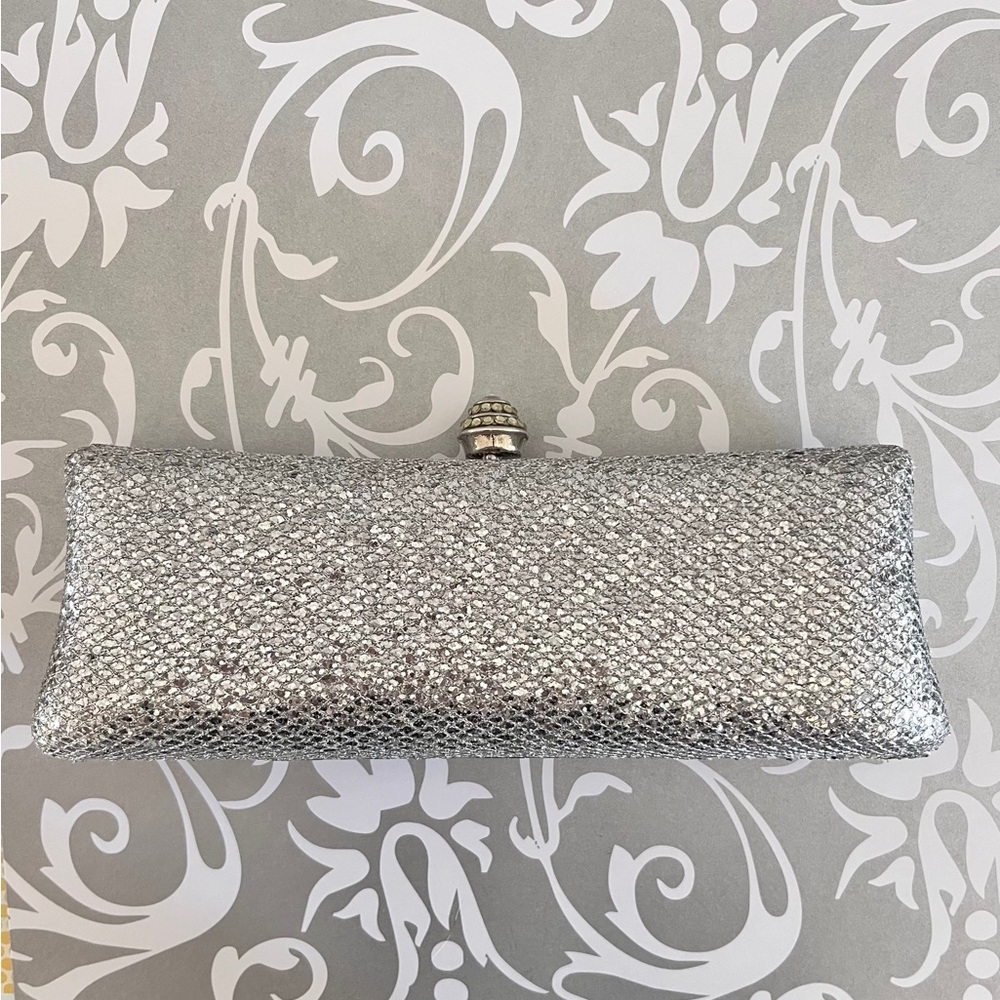 J. Furmani silver hard case clutch purse with jeweled clasp and silver chain